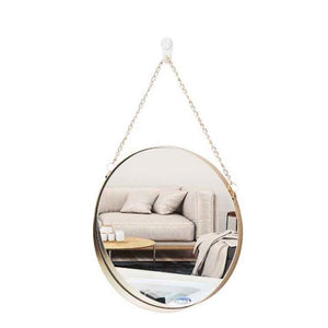 Gold mirror with chain strap.